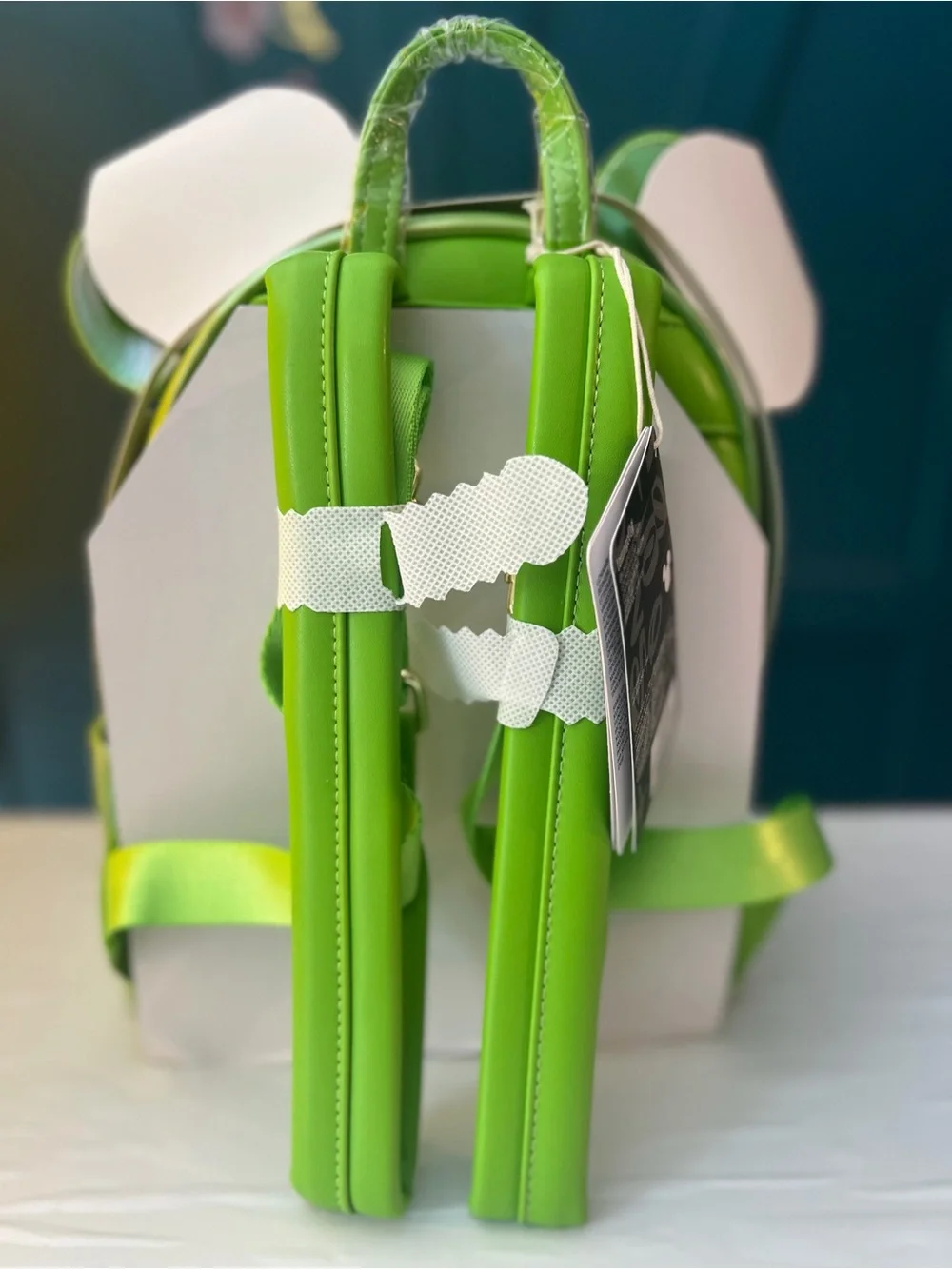 Loungefly Iridescent Green Minnie Bow Mini Backpack